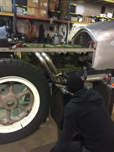 The Roadster Exhaust System being assembled for one of two speedsters being prepared for the Peking to Paris Motor Challenge (A)